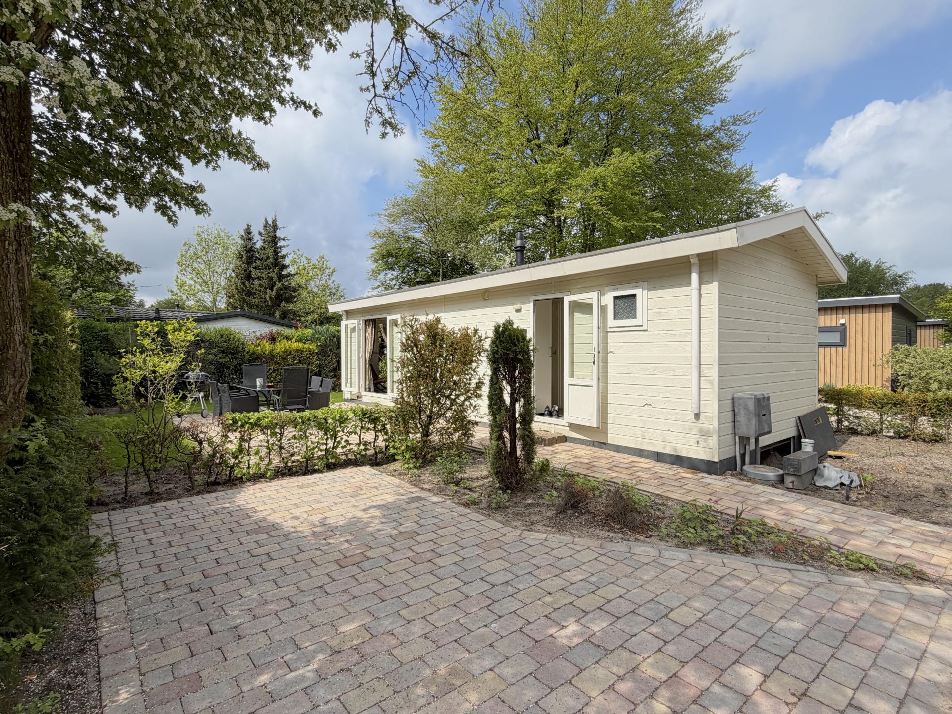 Knus chalet aan de bosrand met zonnig terras in Hulshorst - foto 15