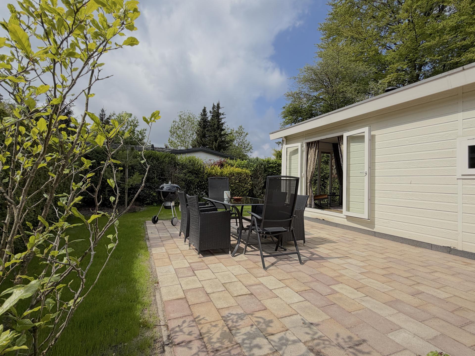 Knus chalet aan de bosrand met zonnig terras in Hulshorst - foto 12