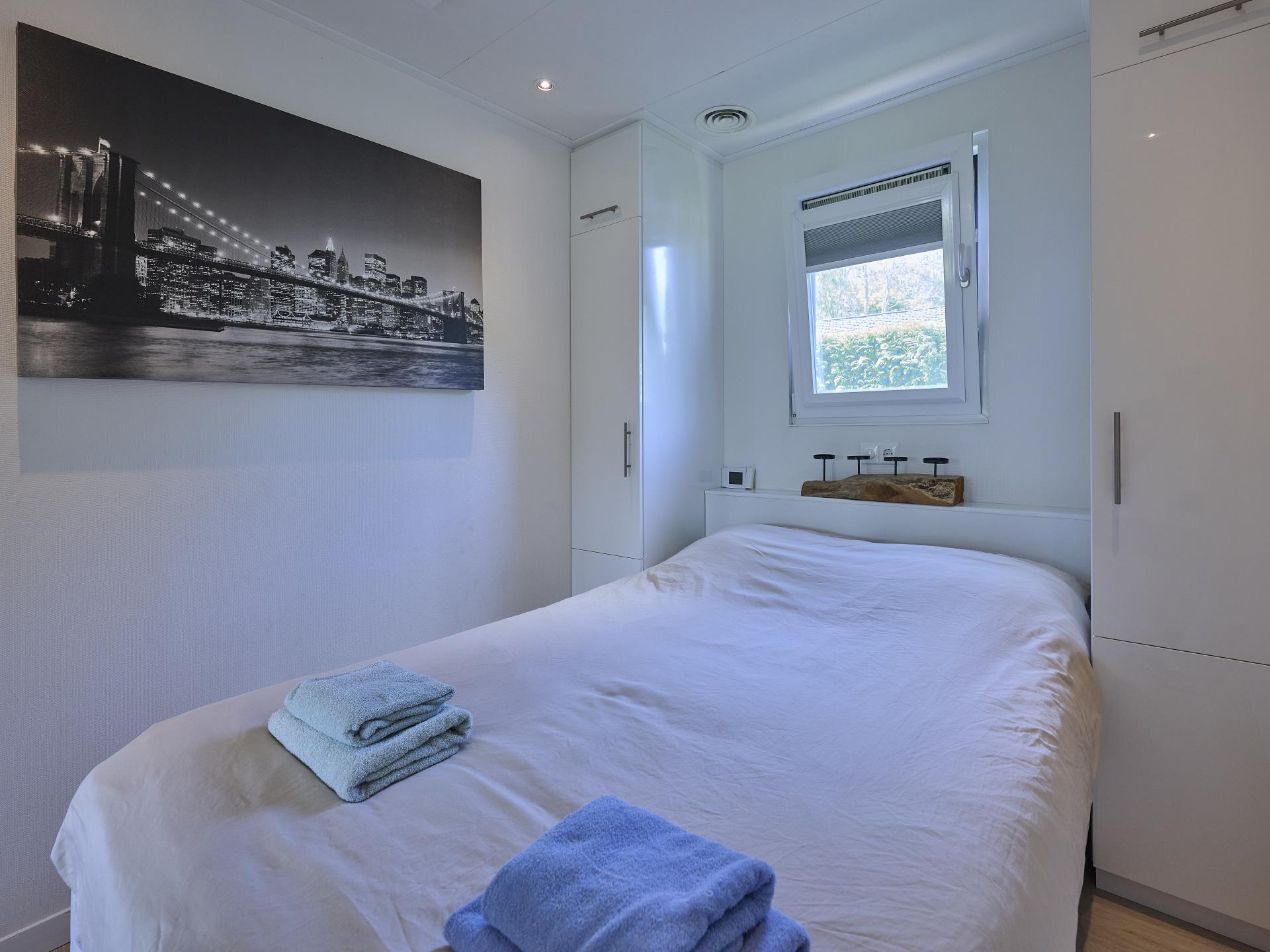 Modern vakantiehuis aan het water met privéjacuzzi op de Veluwe - foto 23