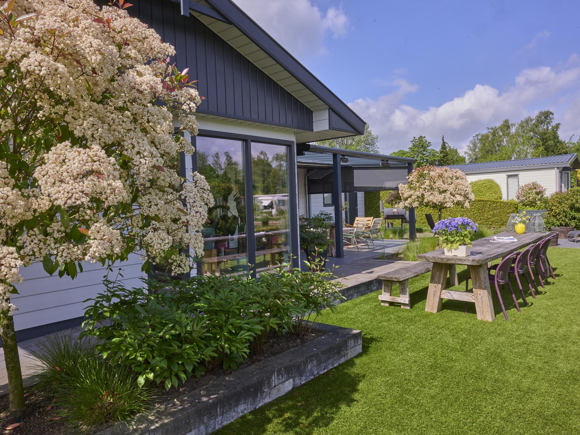 Modern vakantiehuis aan het water met privéjacuzzi op de Veluwe - foto 32