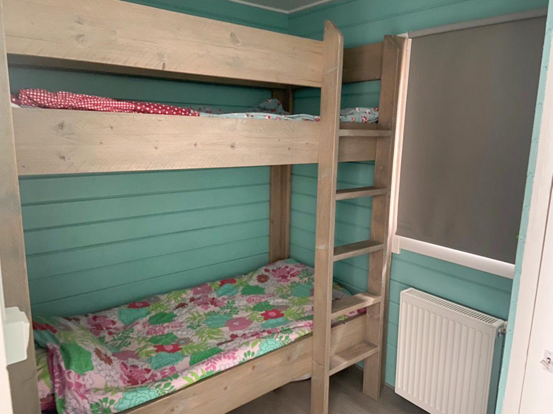 Houten chalet met privé sauna en omheinde tuin op park met zwembad - foto 11