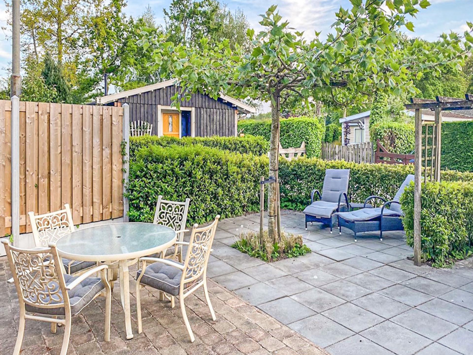 Houten chalet met privé sauna en omheinde tuin op park met zwembad - foto 17