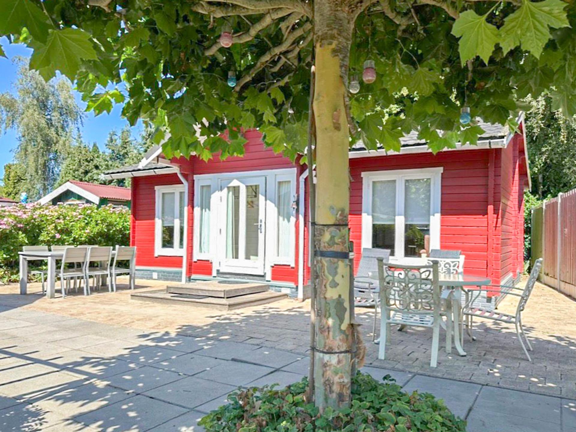 Houten chalet met privé sauna en omheinde tuin op park met zwembad - foto 19
