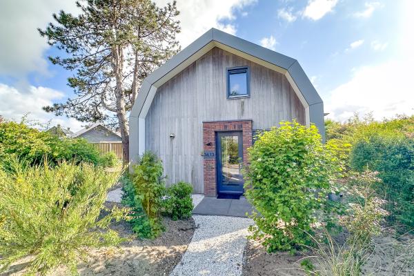 Luxe vakantiewoning met sauna en tuin op rustig park in Egmond - thumbnail 2