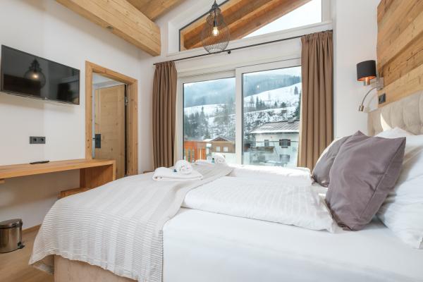 Chalet voor 24 personen met wellness direct aan de skipiste in Mühlbach - thumbnail 4