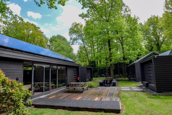 Luxe groepsaccommodatie met sauna in het bos van Haaren, 16 personen - thumbnail 1