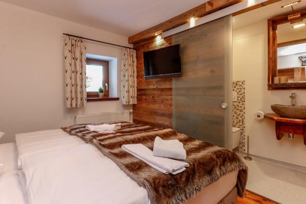 Groots ski-in/ski-out huis in Rauris voor 21 personen met balkon - thumbnail 6
