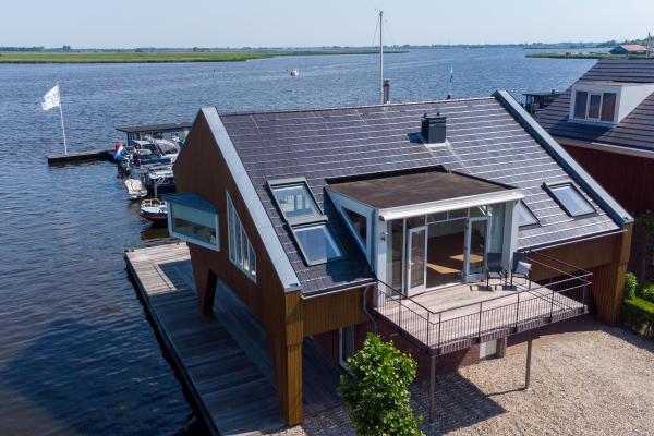Modern penthouse met panoramisch uitzicht op Uitgeestermeer - thumbnail 2