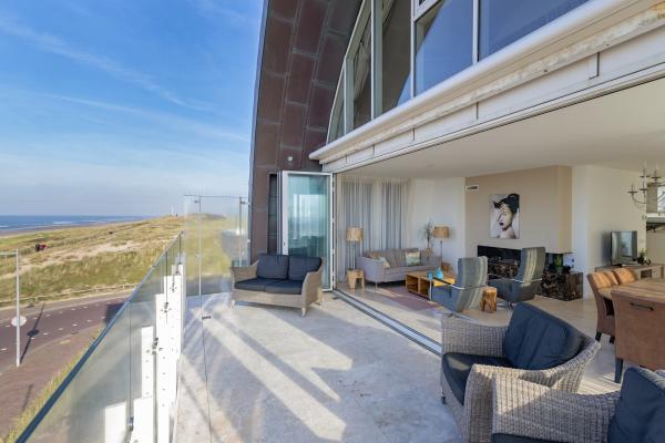 Luxe appartement met zeezicht op 20m van het strand in Egmond aan Zee - thumbnail 1