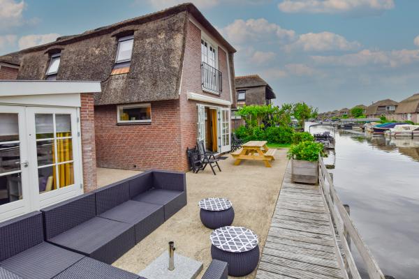 Vrijstaand vakantiehuis met privéterras aan het water in Breukelen - thumbnail 1