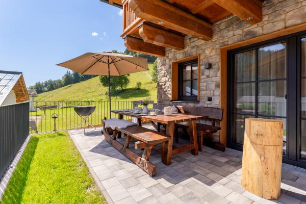 Luxe chalet voor 10 personen met sauna, direct aan de piste in Wagrain - thumbnail 2