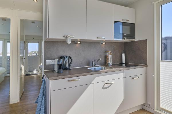Luxe huisboot met panoramisch dakterras in haven van Kerkdriel - thumbnail 5