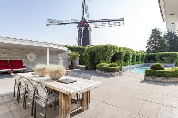 Luxe villa met zwembad, whirlpool en uitzicht op molen in Moergestel - thumbnail 2