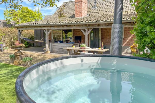 Idyllisch huisje met hottub en haard in Brabantse Kempen - thumbnail 1