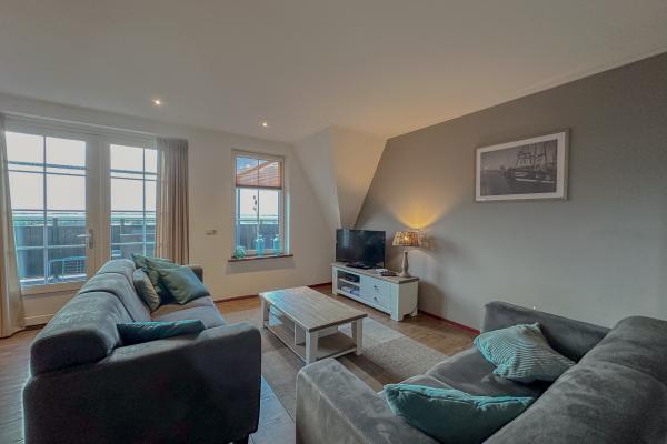Op 750 m van het strand: ruim luxe appartement in centrum Westerland - thumbnail 2