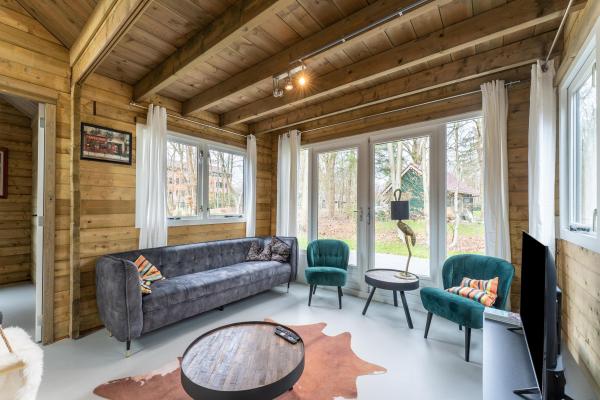 Knus houten vakantiehuis aan bosrand in Soesterberg voor 6 personen - thumbnail 2