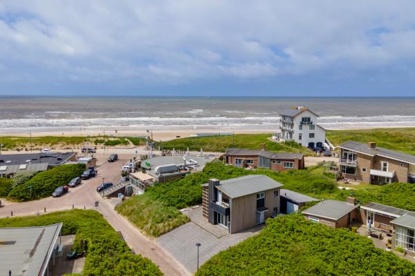 Strandappartement Bergen aan Zee met zeezicht en eigen parkeerplaats - thumbnail 1