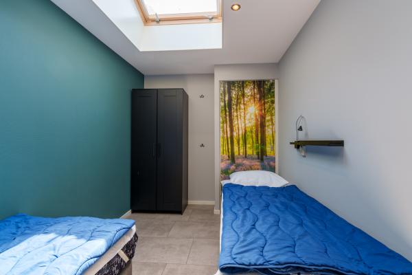 Reggezicht: nieuw vakantiehuis met enorme tuin in hartje Hellendoorn - thumbnail 4