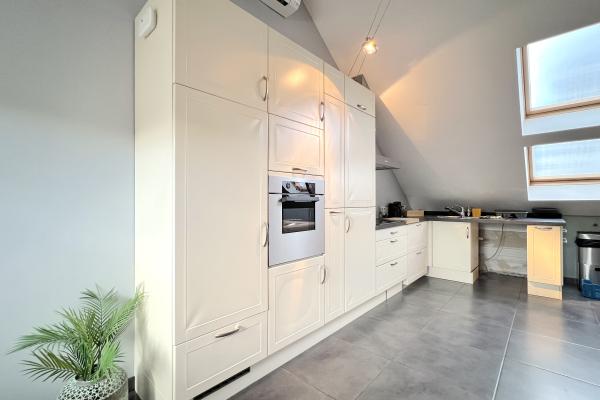 Centraal gelegen ruim appartement met tuin in Genk - thumbnail 3