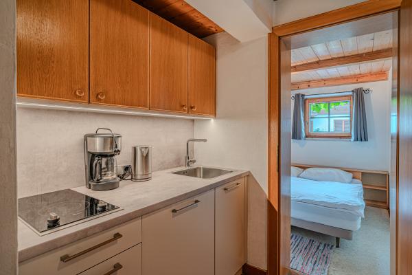 Appartement direct aan de piste in Sankt Johann met terras - thumbnail 6