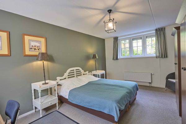 Vrijstaande villa aan bosrand op Veluws vakantiepark voor 8 personen - thumbnail 6