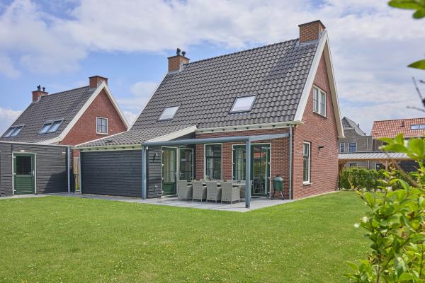 Luxe vrijstaande villa met sauna op 350m van het strand in Colijnsplaat - thumbnail 1