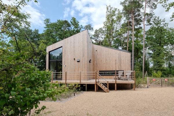 Uniek design vakantiehuis met wellness in rustige Ardense bossen bij Biron - thumbnail 1