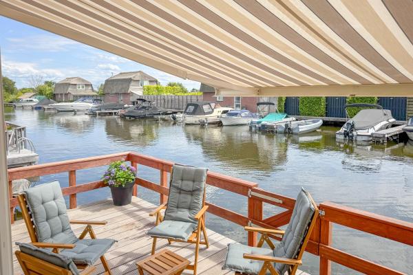 Chalet aan het water in Breukelen met airco en eigen terras - thumbnail 2