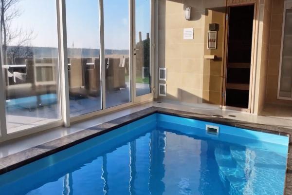 Luxe villa met privézwembad en sauna op 500m van het strand in Zeeland - thumbnail 2