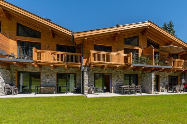 Luxe 8-persoons lodge met privé sauna op 10 minuten van Flachau - thumbnail 1