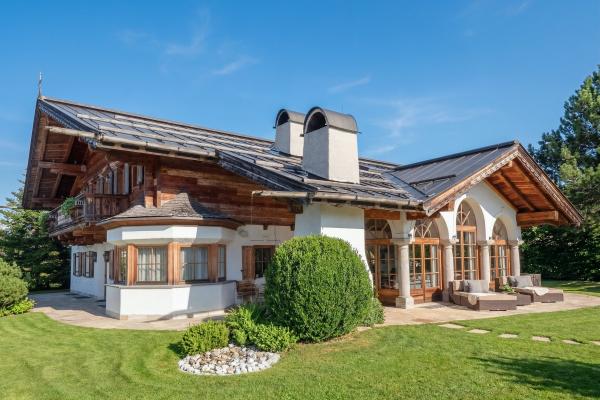 Exclusief chalet voor 14 personen in St. Johann, 200m van de piste - thumbnail 1