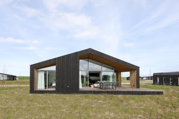 Modern vakantiehuis met wijds uitzicht over Zeeuwse polders, nabij strand - thumbnail 1