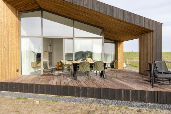Vrijstaand natuurhuis aan water in Wissenkerke, Zeeland - thumbnail 1
