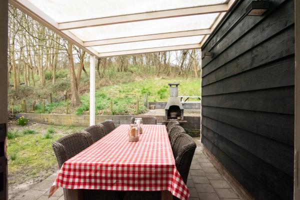Duinhuis met sauna direct aan het Noordzeestrand in Vrouwenpolder - thumbnail 6