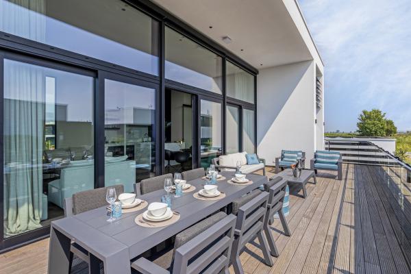 Luxe watervilla met zwembad en steiger aan het water in Kamperland - thumbnail 6