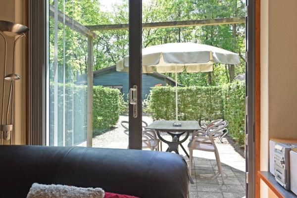 Knusse gezinsbungalow in het groen van Heesch, nabij centrum - thumbnail 3