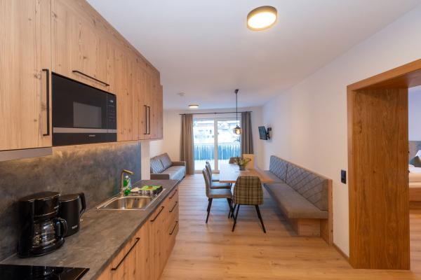 Appartement direct aan de piste met buitensauna in Hinterglemm - thumbnail 2
