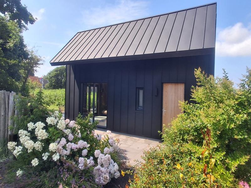 Warm vrijstaand huisje met tuin nabij het strand