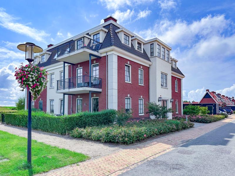 Begane grond woning met Finse sauna nabij zee