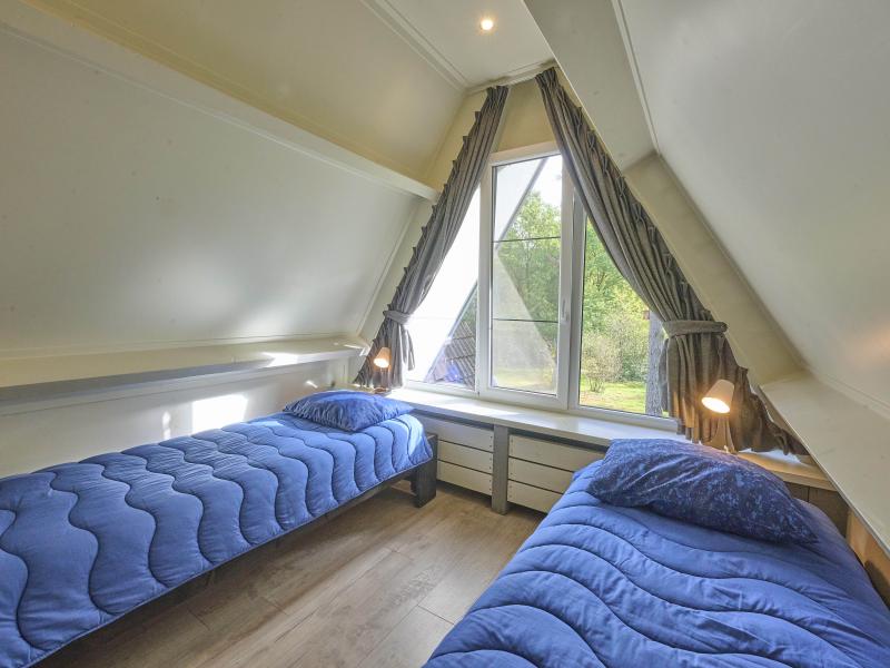 Gezellige bungalow met sauna in bosgebied