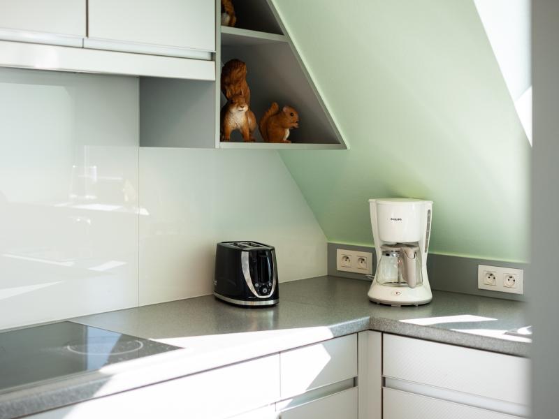 Lichtrijk penthouse met dakterras vlak bij zee